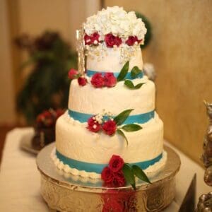 Delicious Turquoise n red wedding cake by Beach Weddings Alabama